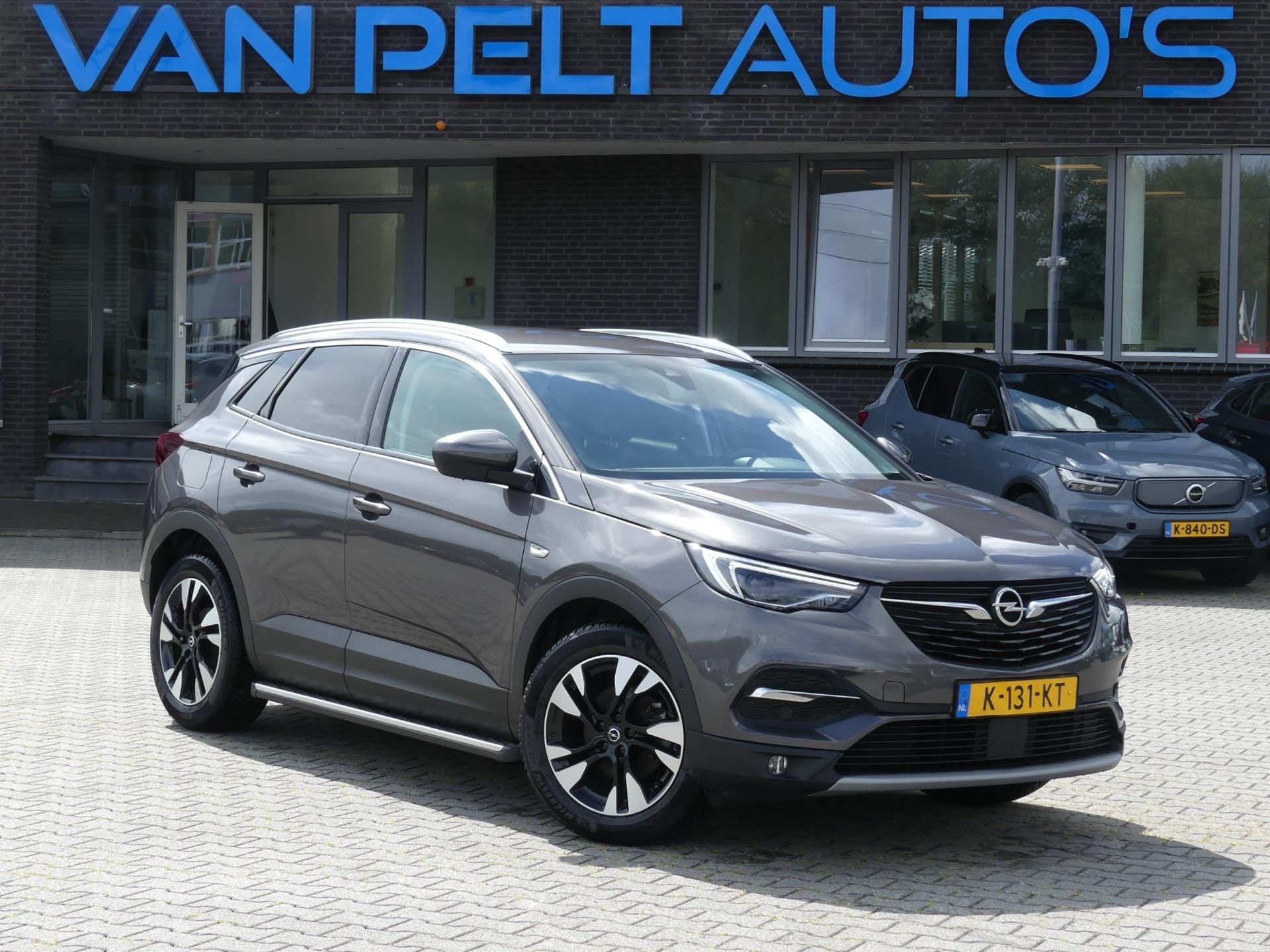 Opel Grandland X 1.2 Turbo EAT-8 Business Executive Ultimate, Auto's, Dealer onderhouden, Gebruikt, 1199 cc, Leder en Stof
