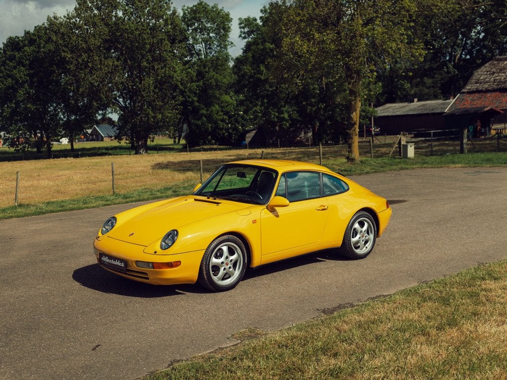 Porsche 911 3.6 Coupé Speedyellow (bj 1996, automaat), Automaat, Achterwielaandrijving, Zwart, 4 stoelen