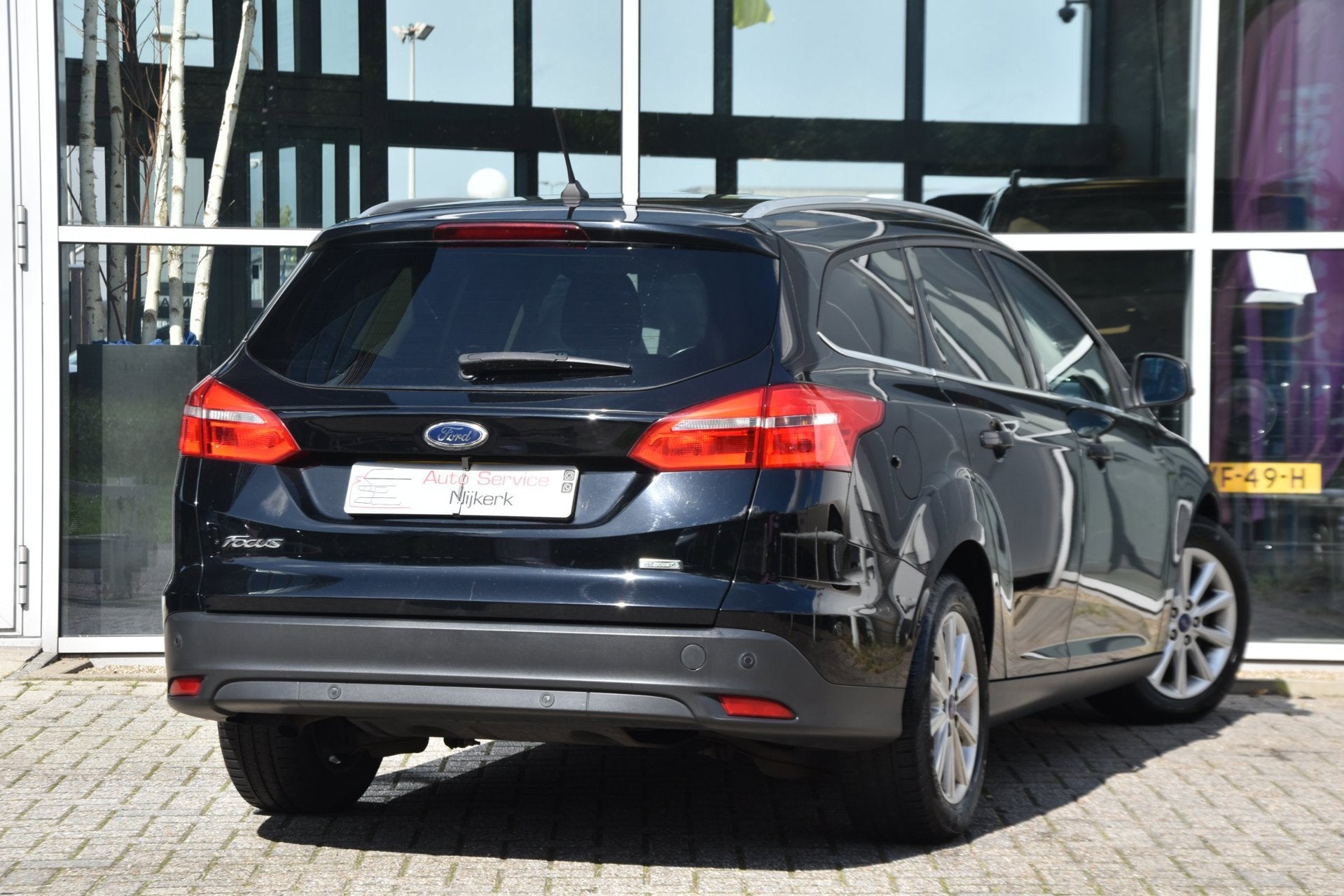 Ford Focus Wagon 1.0 EcoBoost Titanium | Navi | PDC | Cruise, Gebruikt, Zwart, Origineel Nederlands, Handgeschakeld