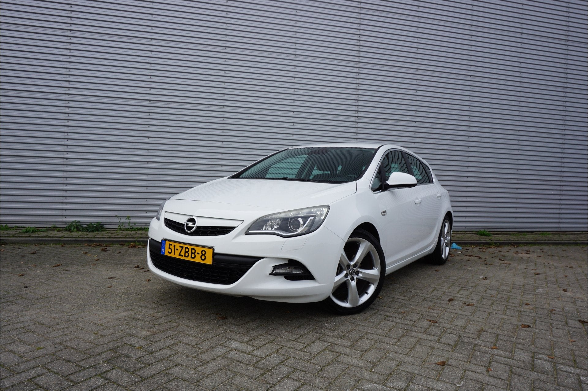 Opel Astra 1.4 Turbo GT Airco / Navi / Cruise / Parkeers / E, Auto's, Voorwielaandrijving, Euro 5, Stof, Gebruikt