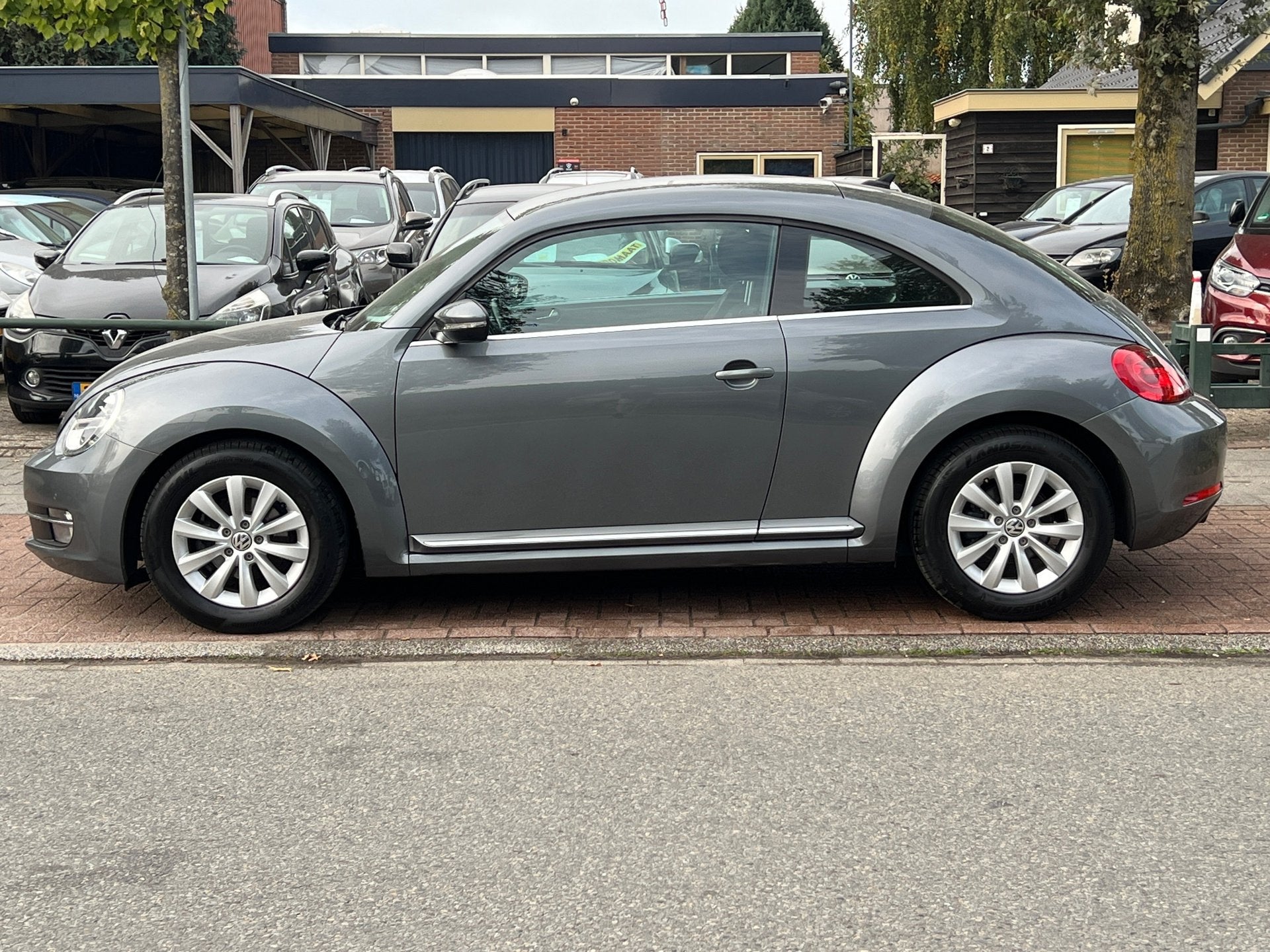 Volkswagen Beetle 1.2TSI *Navi|PDC| Nette Auto, Voorwielaandrijving, Euro 5, Stof, Gebruikt