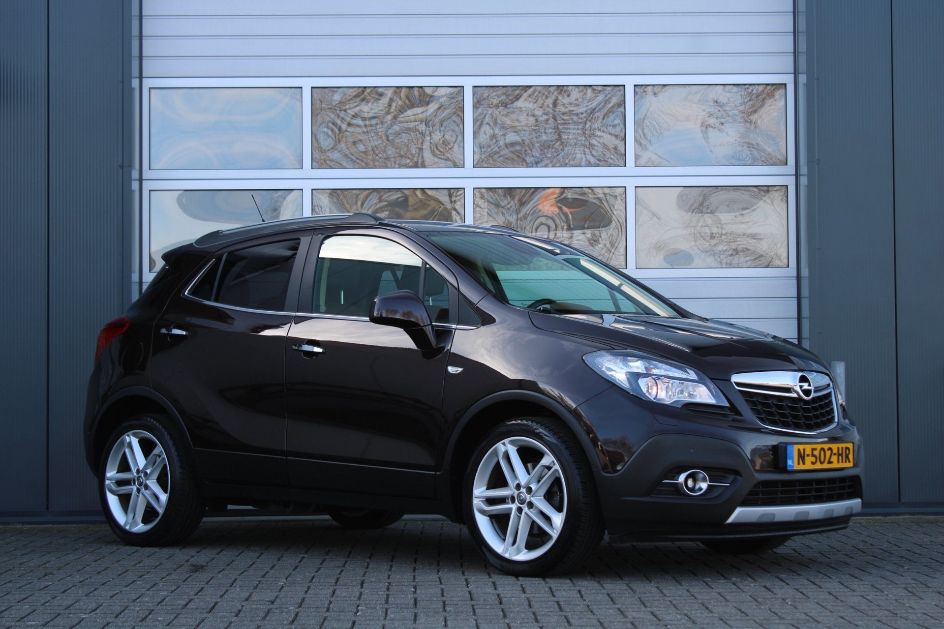 Opel Mokka 1.4 T Cosmo 4x4 140pk Camera/Cruise/Stoel&Stuurve, Auto's, Euro 5, Gebruikt, 4 cilinders, Bruin