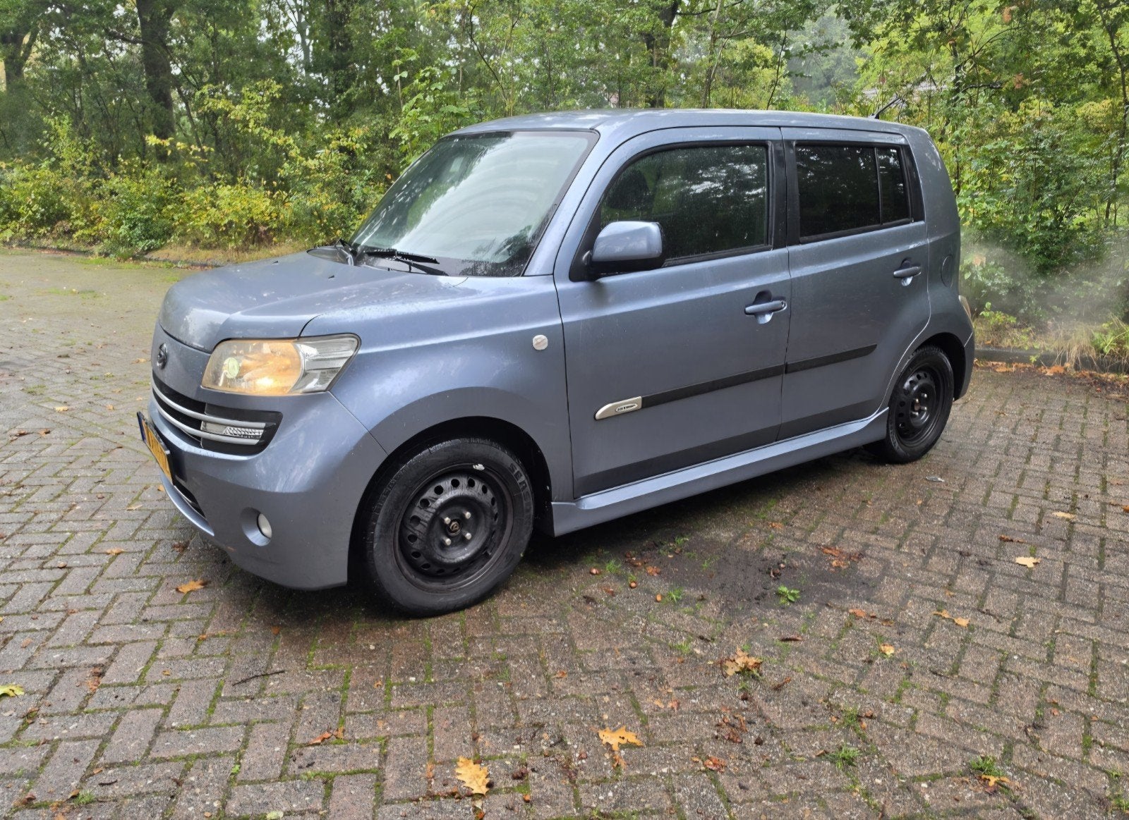 Daihatsu Materia 1.3 2007 Grijs, Auto's, Voorwielaandrijving, 15 km/l, 40 €/maand, 4 cilinders