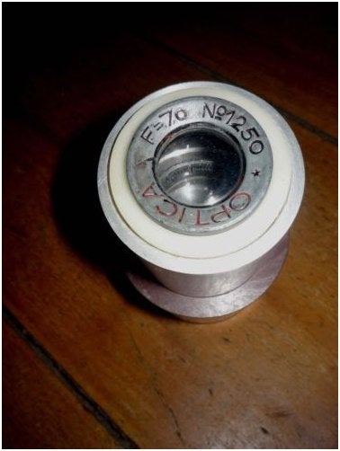35mm lens - Optica F:7,0 No. 1250 met toonlamp houder, Ophalen of Verzenden, 35mm film