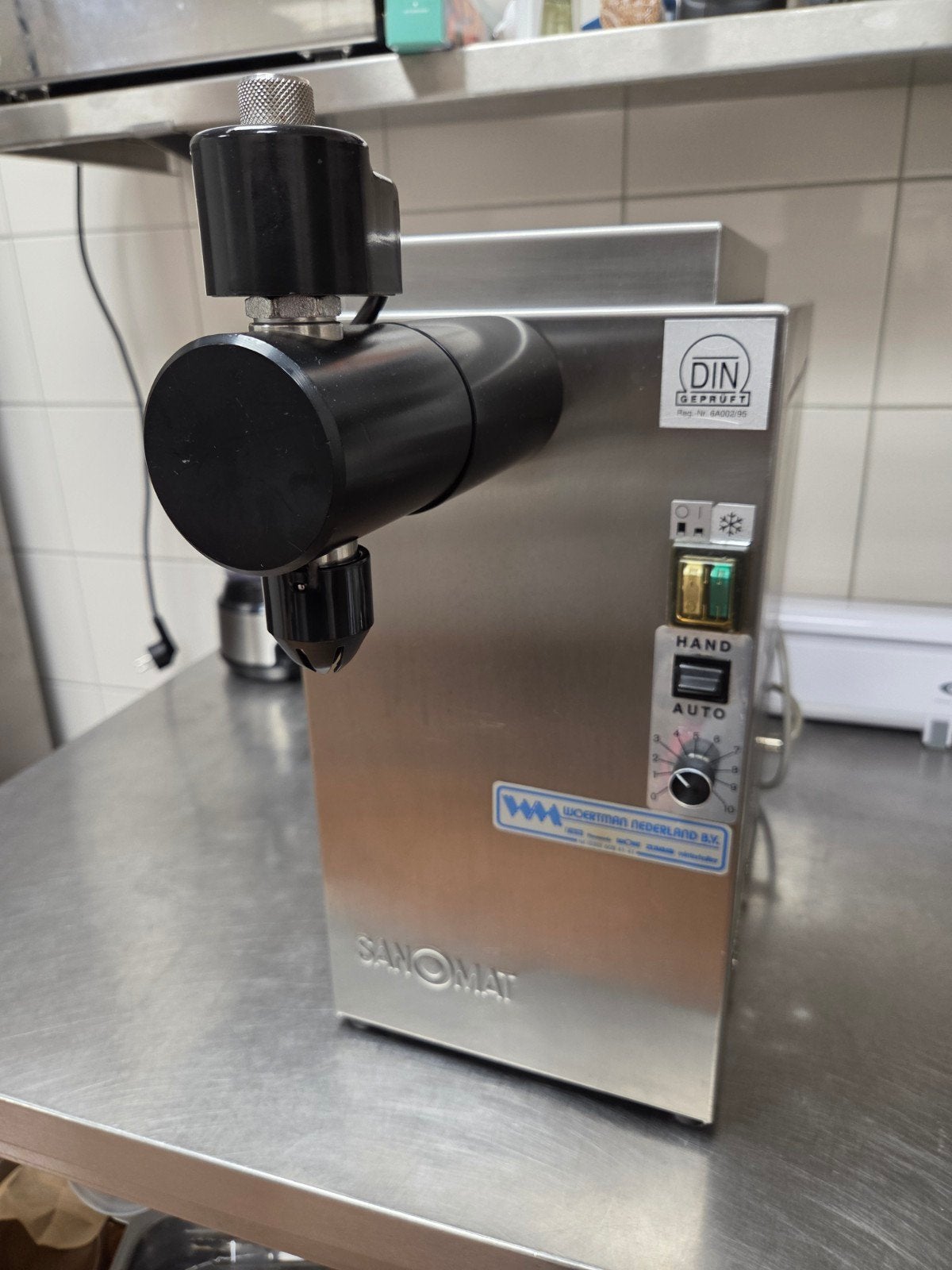 Sanomat slagroommachine, Ophalen, Koelen en Vriezen