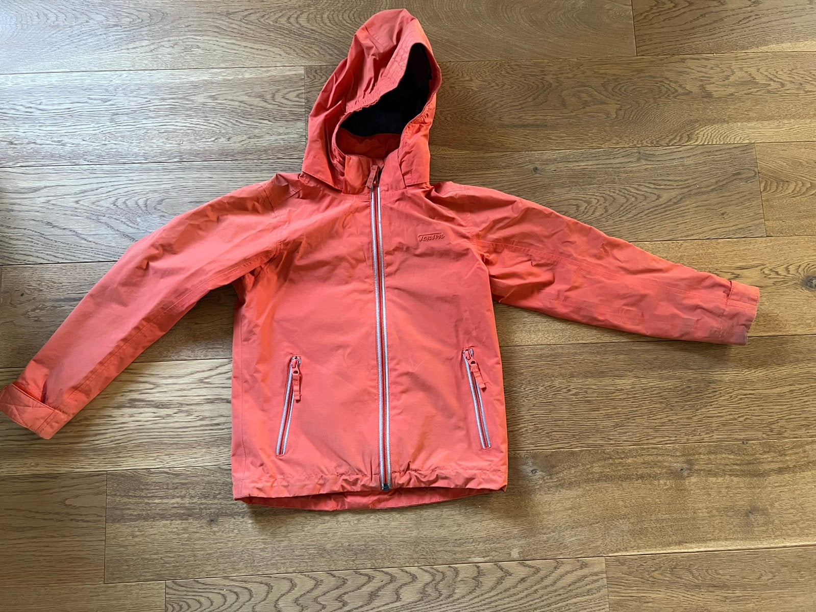 Tenson oranje regenjas/ tussenjas maat 122/128, Kinderen en Baby's, Kinderkleding | Maat 128, Ophalen of Verzenden, Zo goed als nieuw