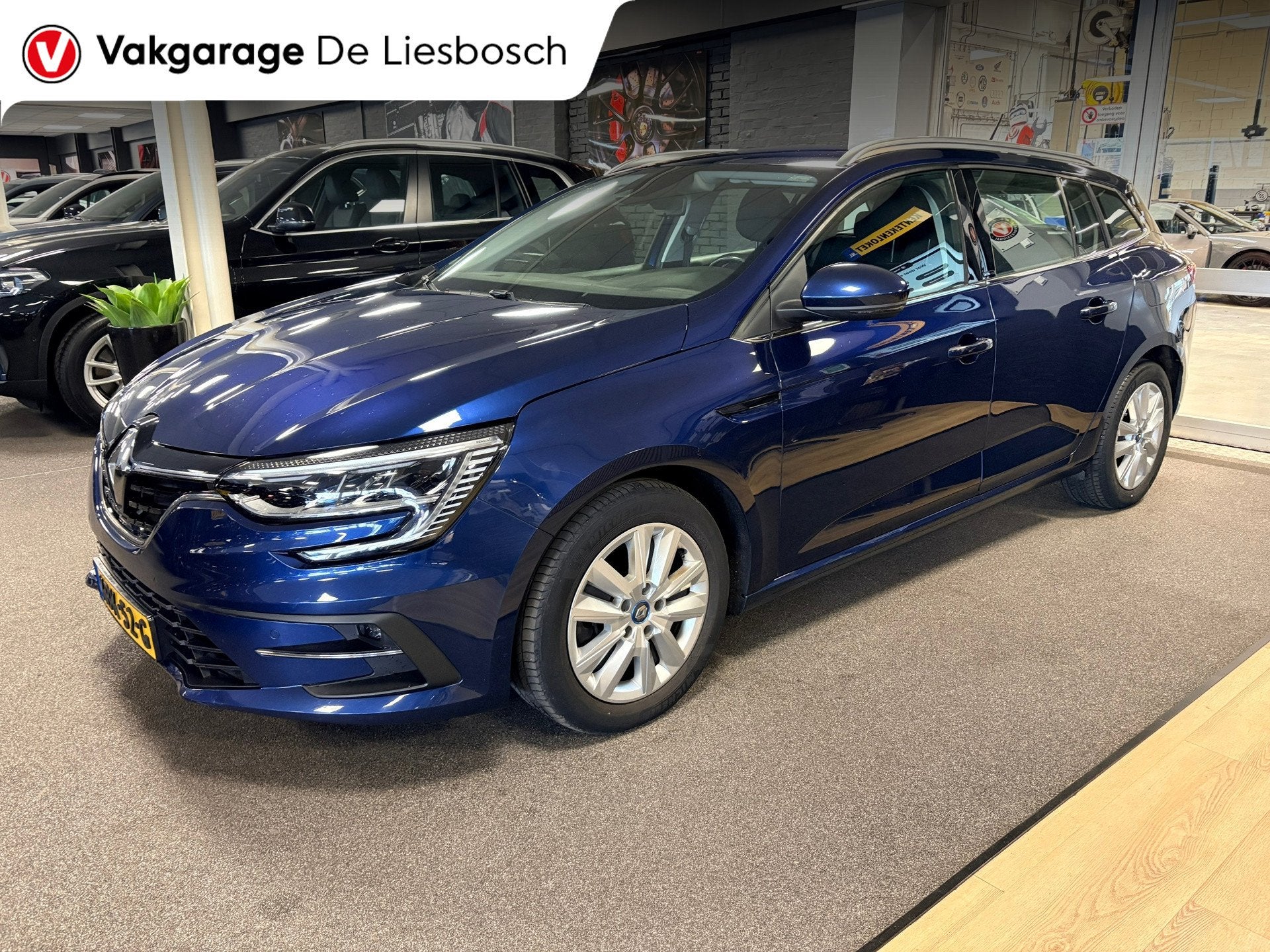 Renault Mégane Estate 1.6 E-Tech Plug-In Hybrid 160 Busines, Auto's, Renault, Dealer onderhouden, Gebruikt, 4 cilinders, Blauw
