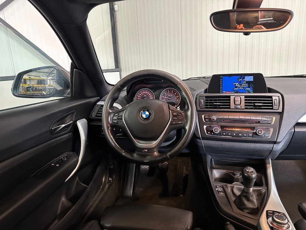 BMW 1-serie 116i 100kw | Executive Sport | Leer | Navi | Xen, Auto's, 136 pk, Gebruikt, Euro 6, 4 cilinders