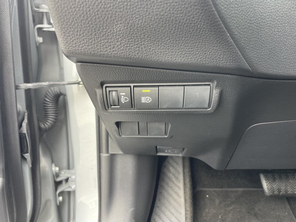 Toyota Corolla Cross Hybrid 140 Dynamic | Navigatie | Origin, Auto's, Stof, Gebruikt, 4 cilinders, Origineel Nederlands