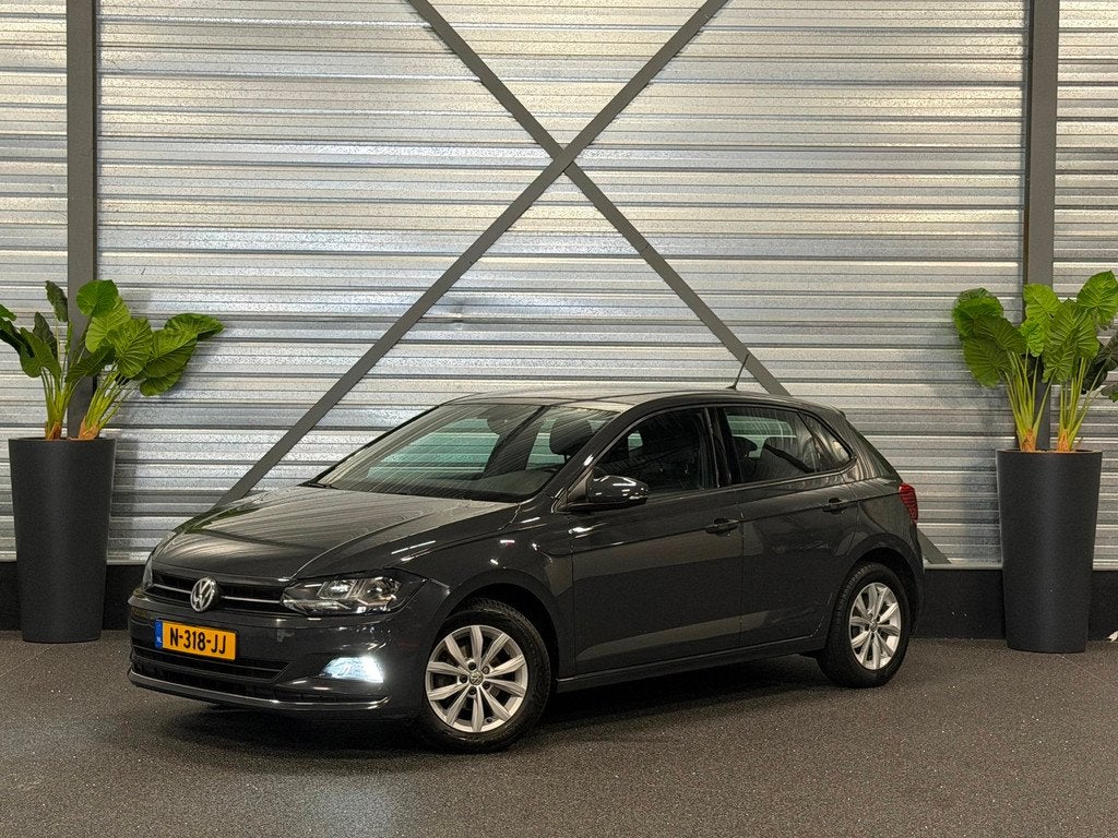 Volkswagen Polo 1.0 TSI Comfortline NAVI/CRUISE/PDC/HALF-LED, Auto's, Volkswagen, Voorwielaandrijving, Euro 6, Leder en Stof, 23 km/l