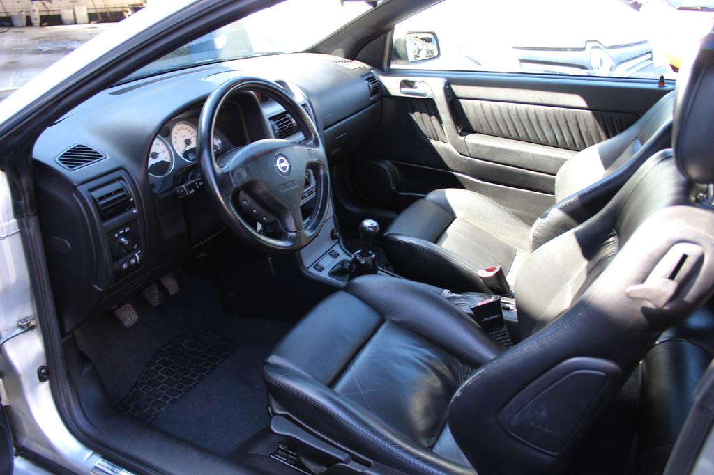 Opel Astra Cabriolet 2.2-16V "Bertone" Leder - Xenon - Cruis, Auto's, Opel, Voorwielaandrijving, Gebruikt, Zwart, 4 cilinders
