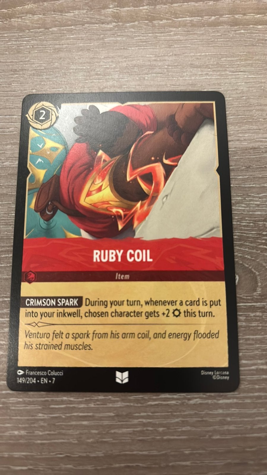 Disney Lorcana Ruby Coil 149-204 7ARI nonfoil, Hobby en Vrije tijd, Ophalen of Verzenden, Zo goed als nieuw