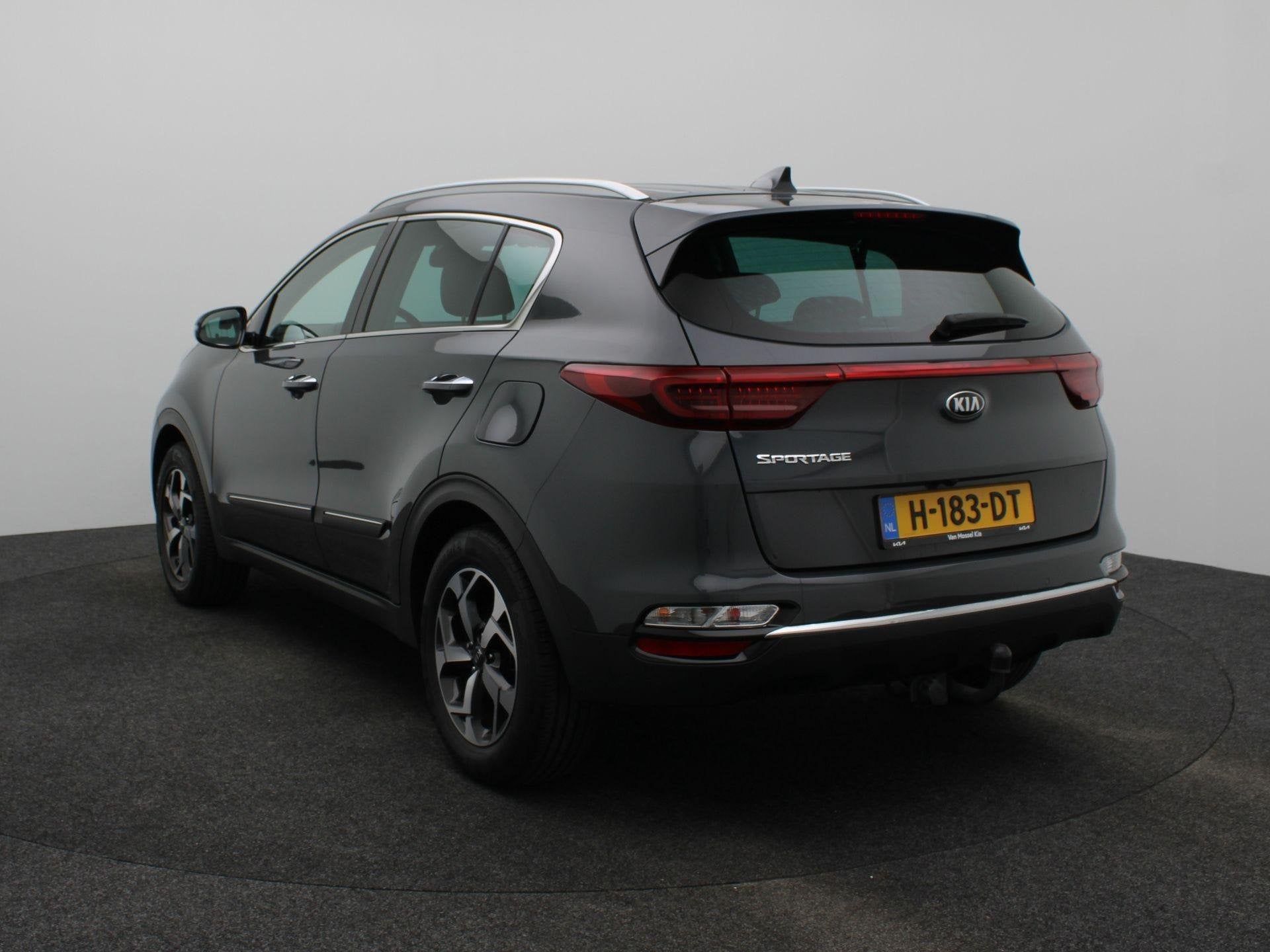 Kia Sportage 1.6 T-GDI DynamicLine | Leer | Trekhaak | Airco, Auto's, 12 maanden, Stof, Gebruikt, 4 cilinders
