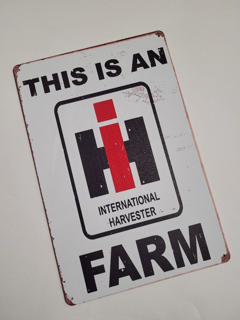 This is an International Harvester reclamebord van metaal, Verzamelen, Reclamebord, Info@deconoord.nl, Deco Noord, Nieuw