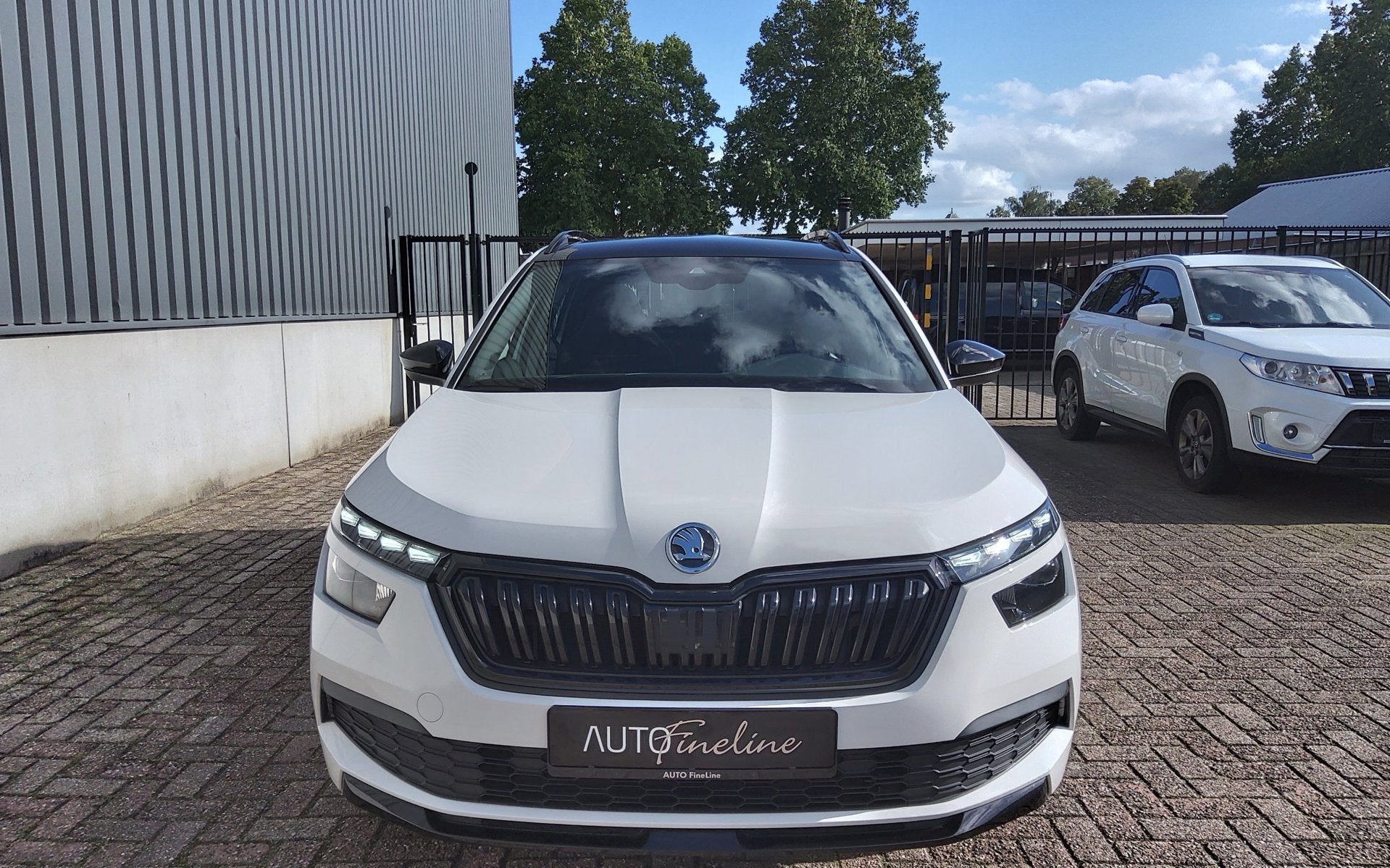 Skoda Kamiq 1.0 TSI Monte Carlo|7-DSG|Panoo-CarPlay|NIEUW!, Auto's, Stof, Gebruikt, Zwart, Wit