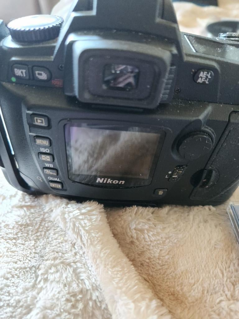 Nikon d70 met sigma 50 1502.8 hsm  natuurlijk lader batterij, Audio, Tv en Foto, Fotocamera's Digitaal, Ophalen of Verzenden, Nikon