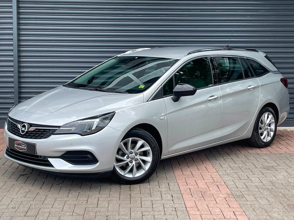 Opel Astra Sports Tourer 1.2 Business Elegance Lane Ass | Ca, Auto's, Opel, Voorwielaandrijving, Stof, Gebruikt, Euro 6