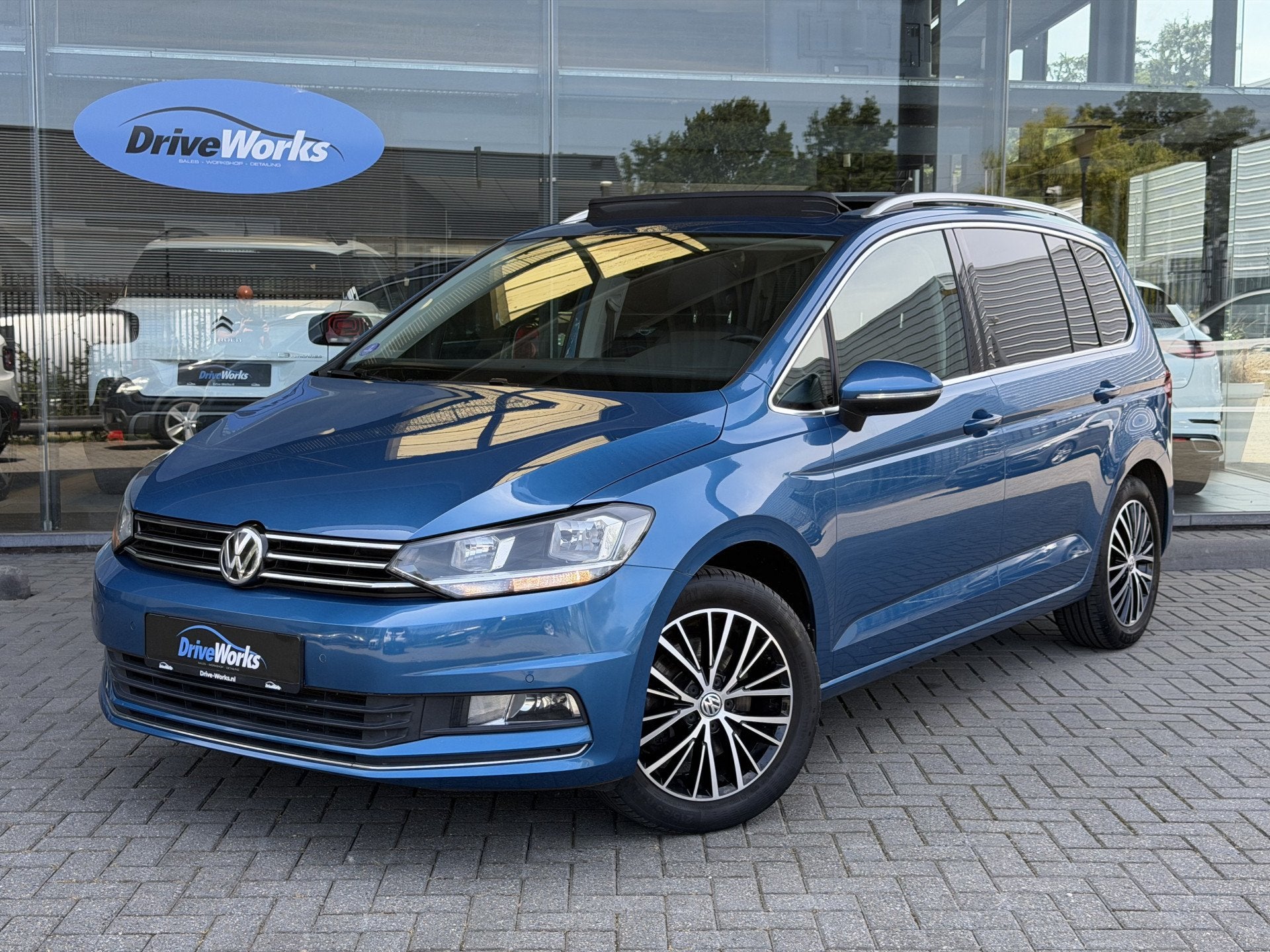 Volkswagen Touran 1.4 TSI Highline | Automaat | Panorama | A, Dealer onderhouden, 4 cilinders, Blauw, Leder en Stof