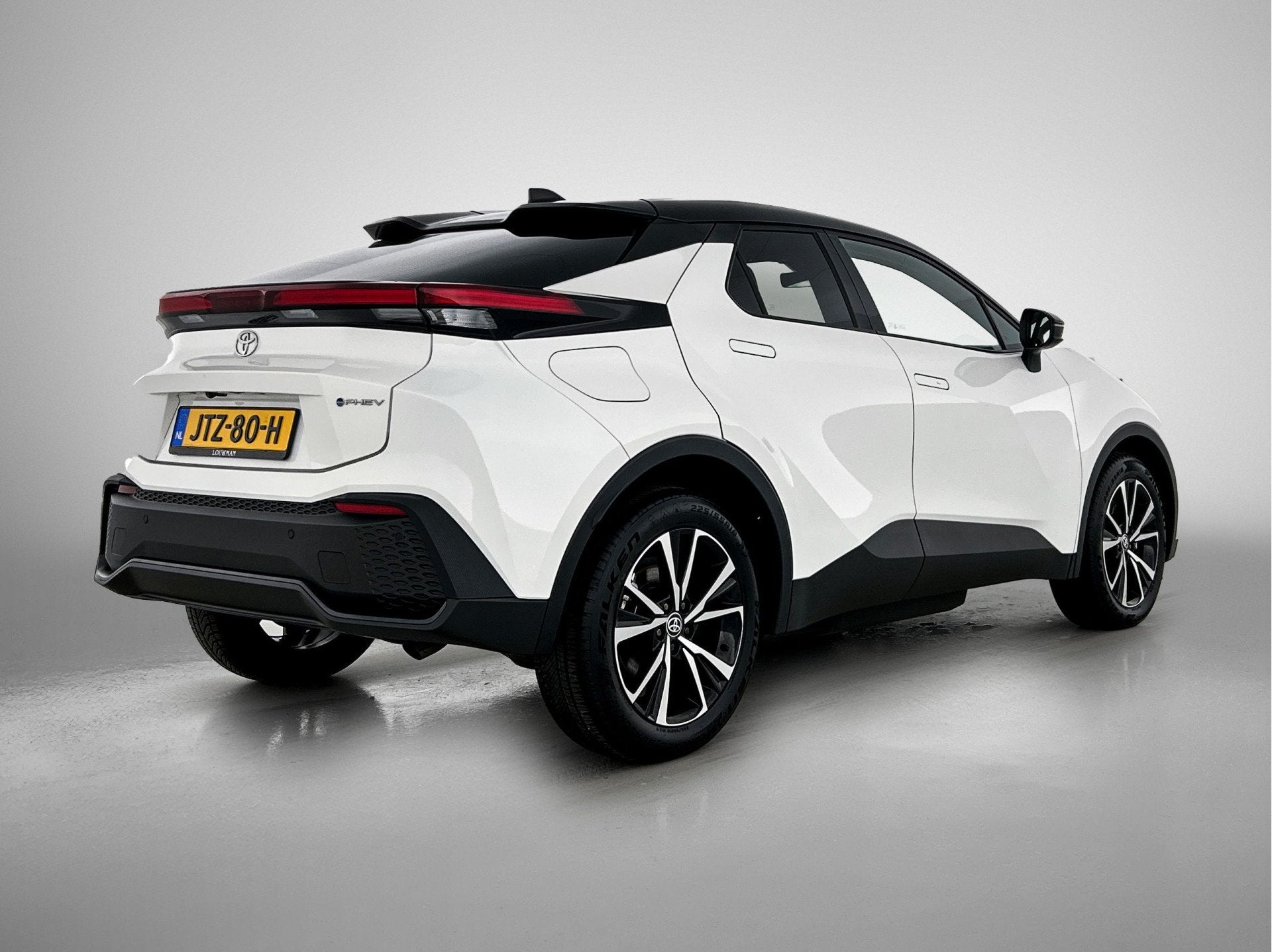 Toyota C-HR 2.0 Plug-in Hybrid 220 First Edition | Bi-Tone |, Auto's, 12 maanden, Stof, 4 cilinders, Wit