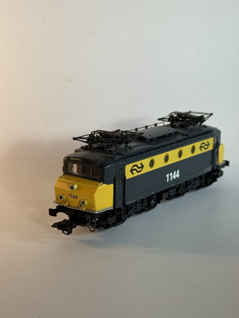 Märklin 37241 H0 E-loc NS 1144 botsneus geel/grijs digitaal, Wisselstroom, Gebruikt, Locomotief, Ophalen of Verzenden