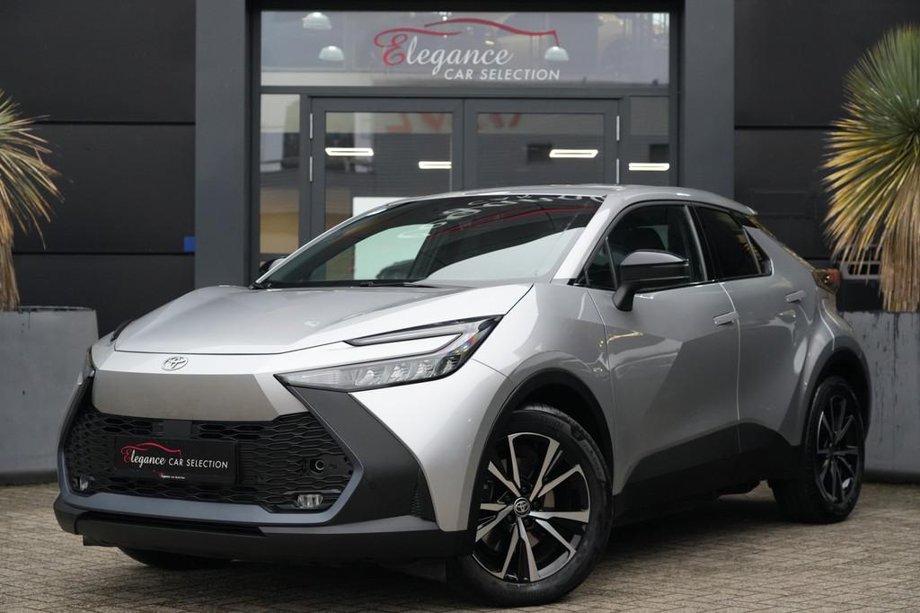 Toyota C-HR 2.0 Plug-in Hybrid 220 Dynamic 223pk Stoelverwar, Auto's, Toyota, Stof, 4 cilinders, 1645 kg, Bedrijf