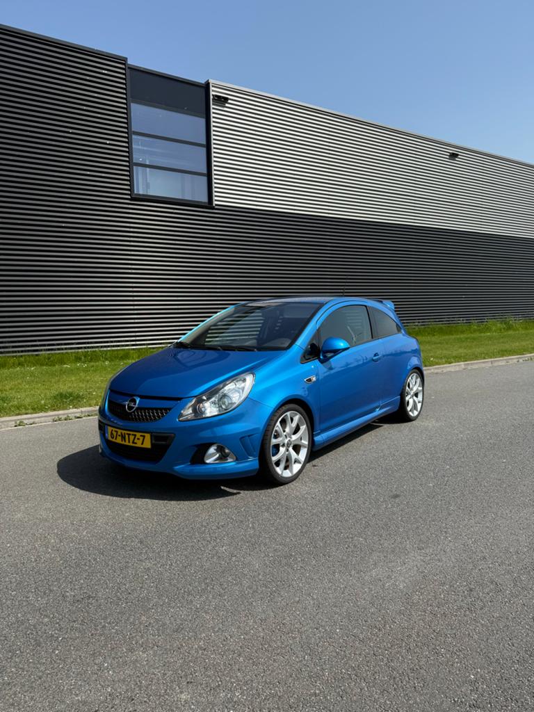 Opel Corsa 1.6 OPC 3D 2010 Blauw 192pk!, Auto's, Voorwielaandrijving, Automatische klimaatregeling, Blauw, Leder en Stof