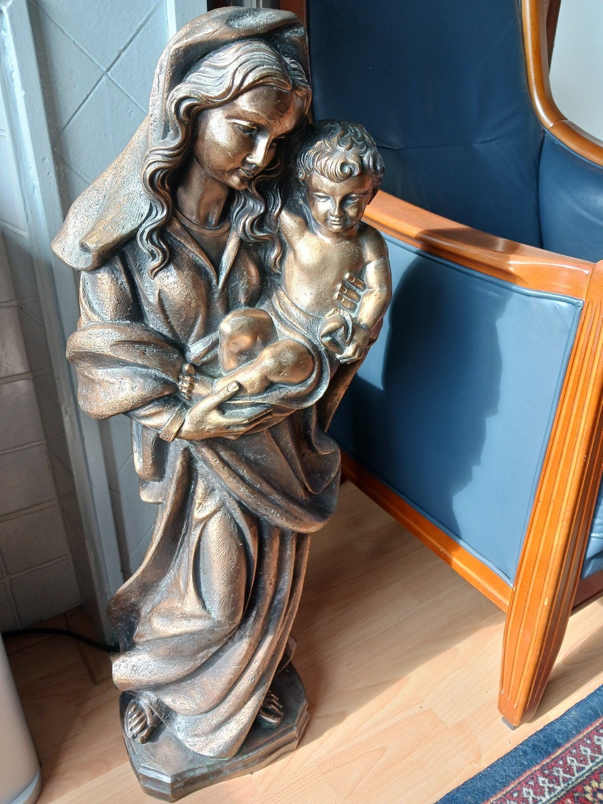 Bronzen beeld Maria met kindje Jezus, Ophalen