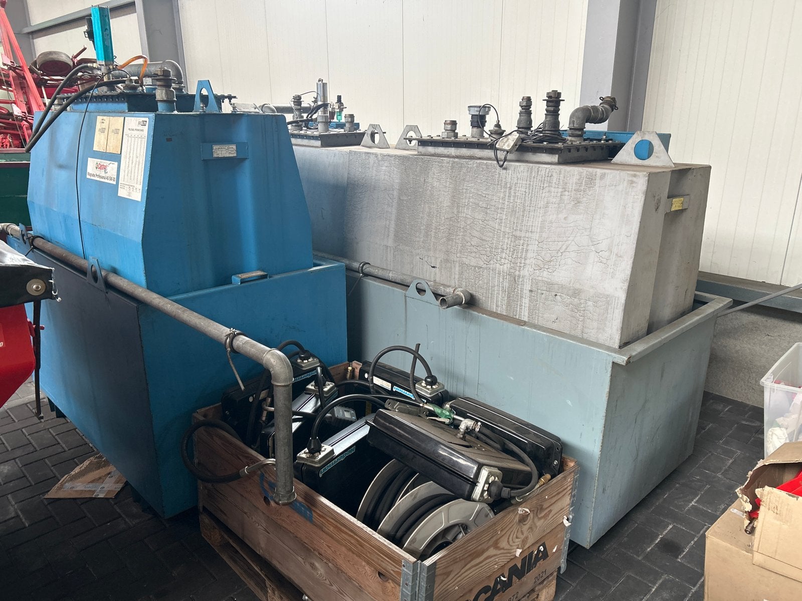 Bulk tanks met haspels en digitale tellers, Ophalen
