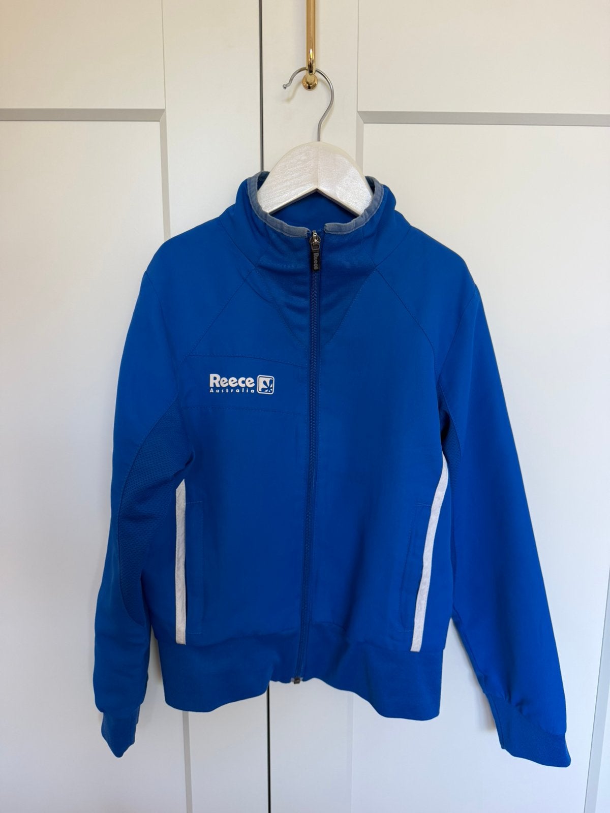 Reece trainingsvest kobaltblauw maat 128 – als nieuw, Ophalen of Verzenden, Zo goed als nieuw, Jongen of Meisje, Trui of Vest