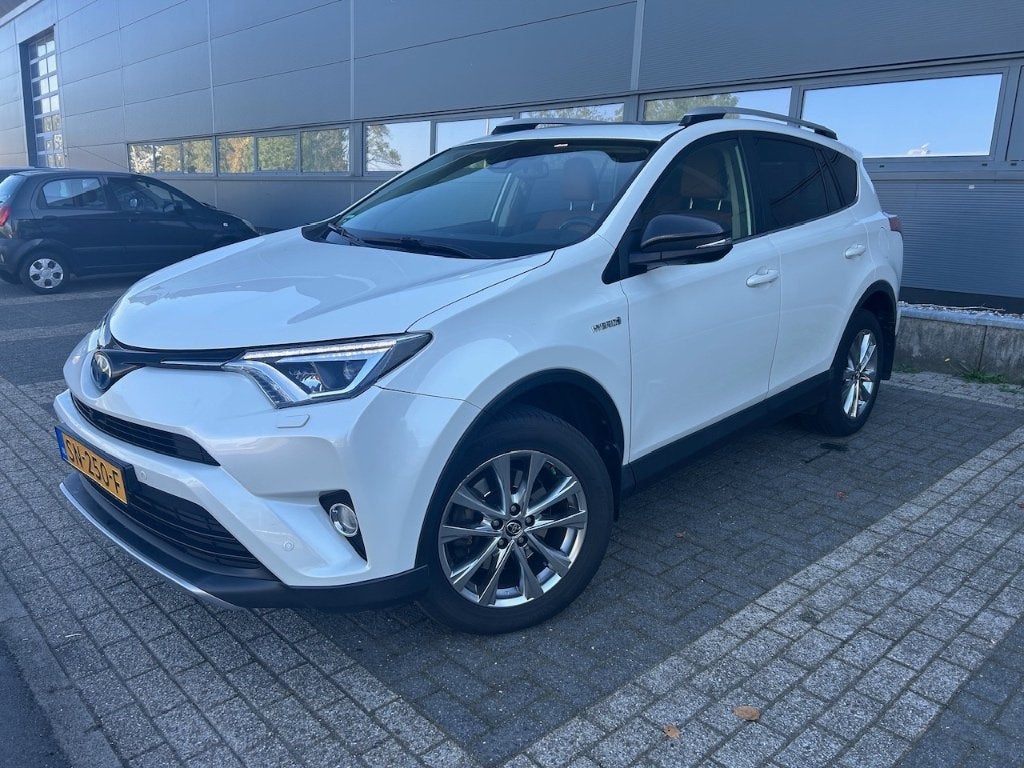 Toyota Rav4 2.5 Vvt-i Hybrid 155pk AWD Aut 2017 Wit, Auto's, Automaat, 1650 kg, Wit, Leder