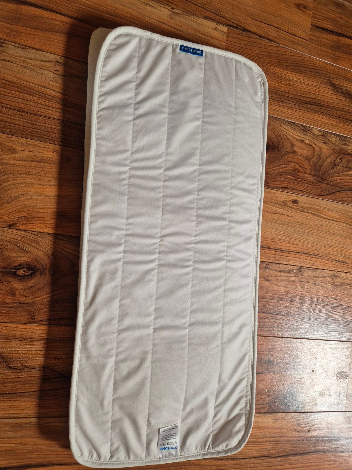Evolution matras en matrasbeschermer 90x40, Ophalen, Zo goed als nieuw, Wieg