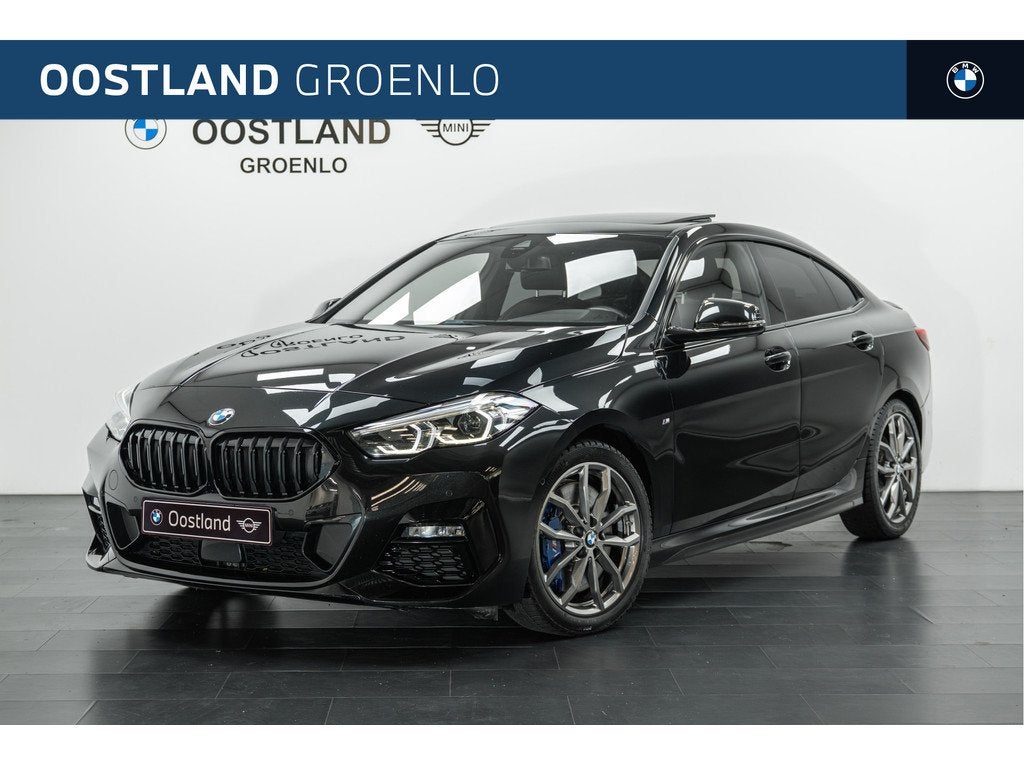 BMW 2 Serie Gran Coupé 218i Executive M Sport Automaat / Pa, Auto's, BMW, 12 maanden, 136 pk, 1350 kg, Leder en Stof