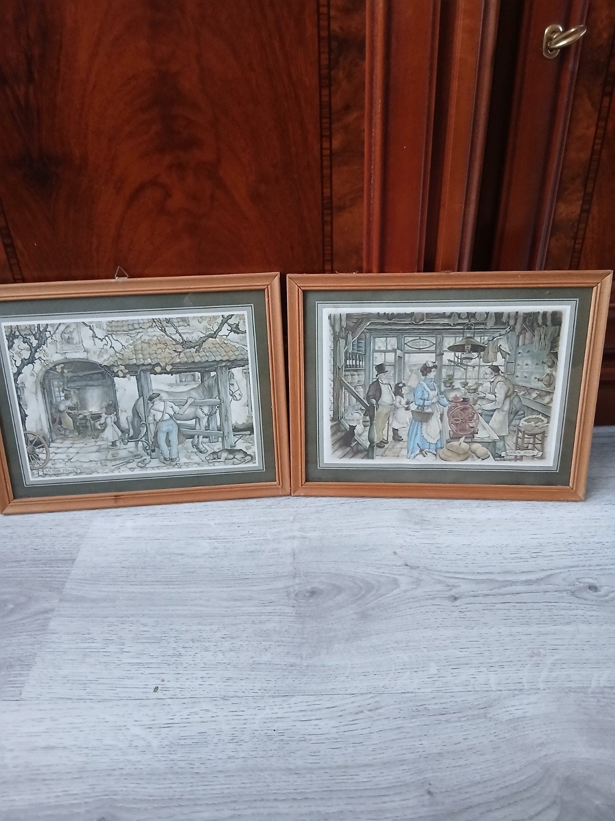 Set van 2 Anton Pieck prenten - Hoefsmid en Bakkerij, Realistisch, Ophalen of Verzenden, Gedateerd, Print