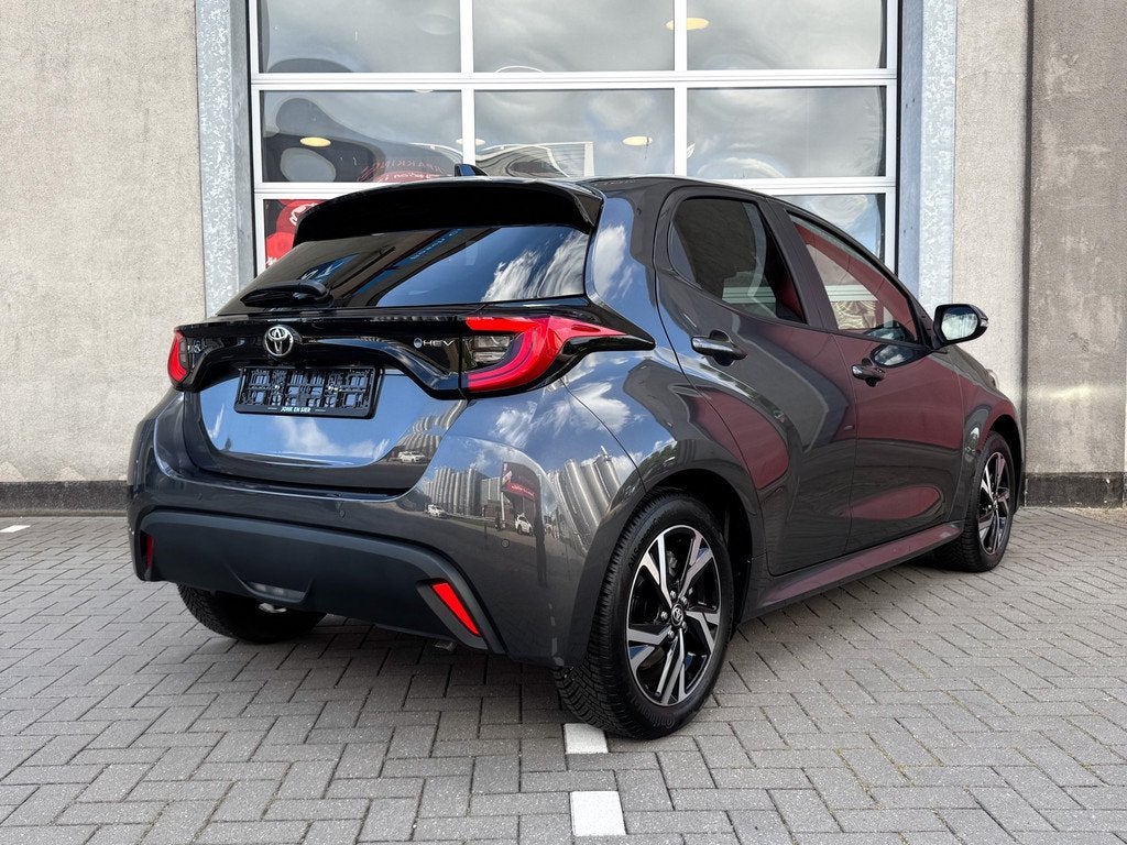 Toyota Yaris 1.5 Hybrid 115 Dynamic|Comfort Pack|Apple CarPl, 12 maanden, Stof, Gebruikt, Zwart