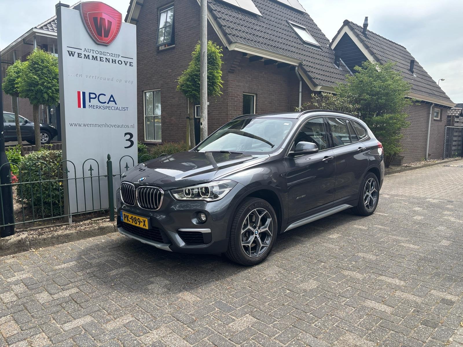 BMW X1 xDrive20i Centennial High Executive Automaat 8-Traps, Gebruikt, Leder en Stof, Bedrijf, SUV of Terreinwagen