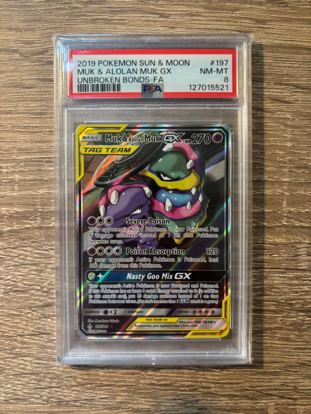Pokémon Unbroken Bonds - Muk & Alolan Muk GX 197/214 - PSA 8, Ophalen of Verzenden, Zo goed als nieuw