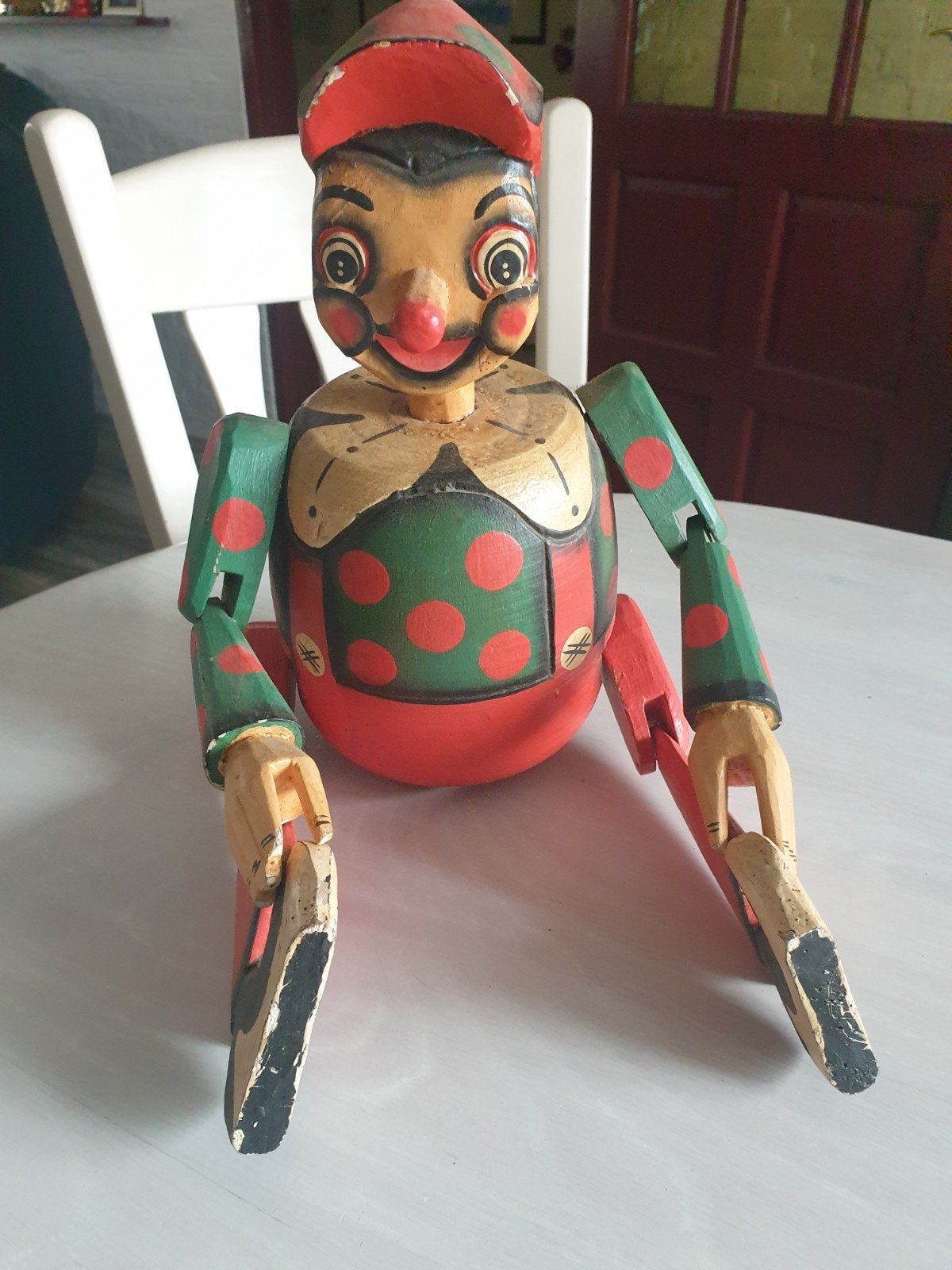 Antieke harlekijn spaarpot, Ophalen