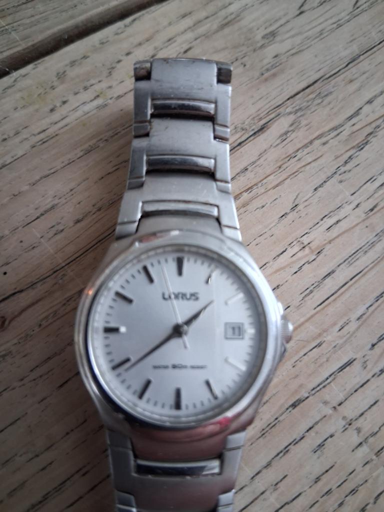 Horloge lotus, Sieraden, Tassen en Uiterlijk, Horloges | Dames, Ophalen of Verzenden, Gebruikt, Staal, Overige merken