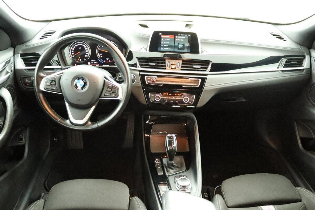 BMW X2 sDrive18i Executive Airco Cruise Automaat LED, Auto's, BMW, Gebruikt, Wit, Bedrijf, Automatische klimaatregeling