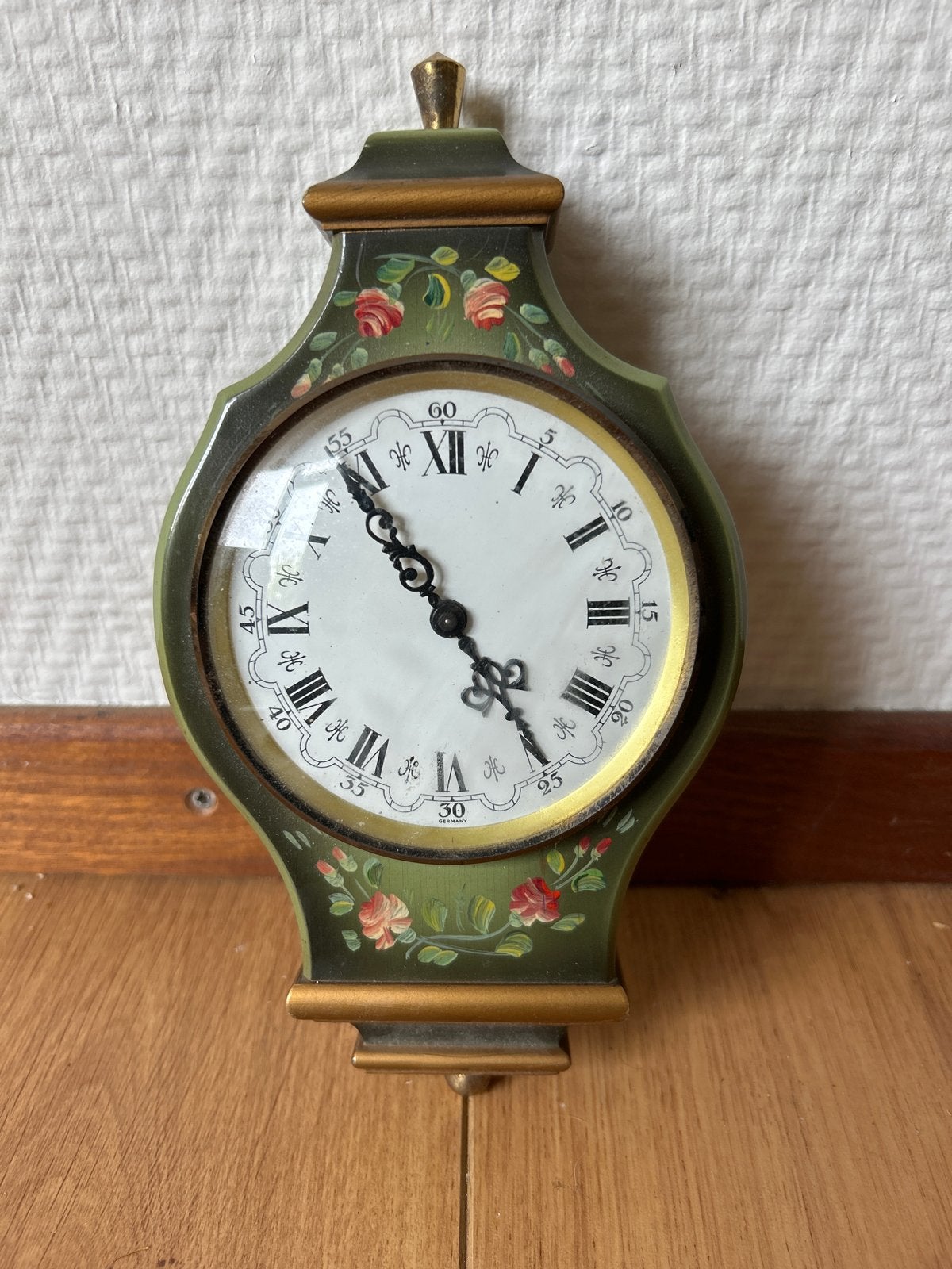 Vintage wandklok met bloemmotief, Ophalen of Verzenden