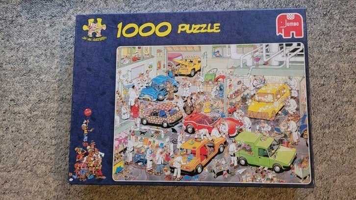 Jan van Haasteren ( 1000 stukjes ) de Autospuiterij.-, Hobby en Vrije tijd, Denksport en Puzzels, Ophalen of Verzenden, 500 t/m 1500 stukjes