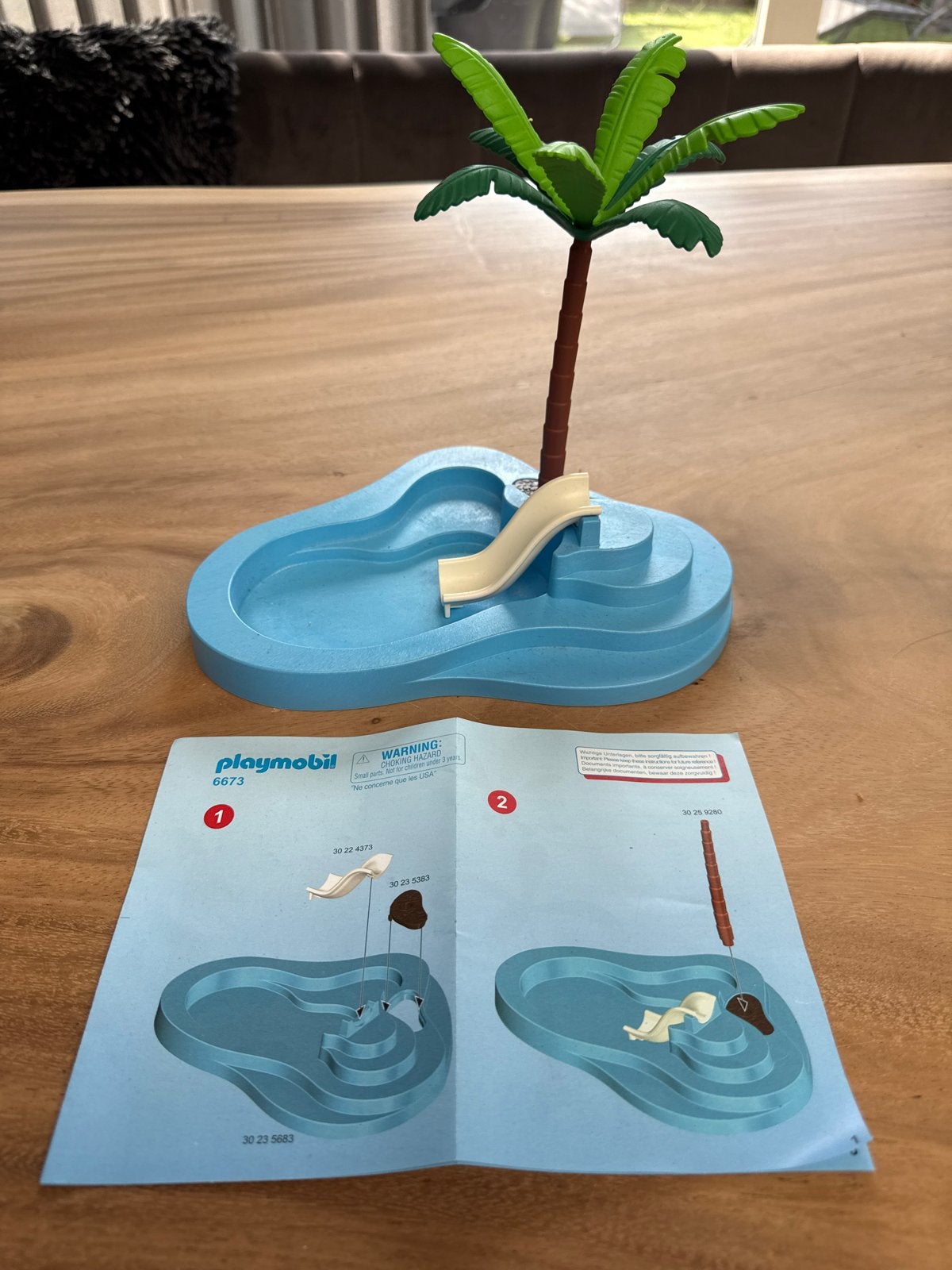 Playmobil 6673 Zwembad met palmboom en glijbaan, Gebruikt, Complete set, Overige typen, Ophalen of Verzenden