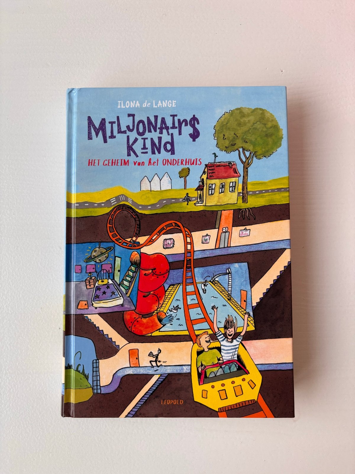 Ilona de Lange - Miljonairskind, Boeken, Ophalen, Zo goed als nieuw, Ilona de Lange, Fictie