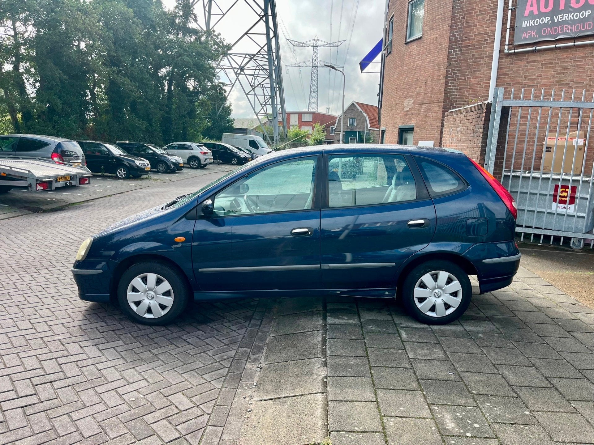 Nissan Almera Tino 1.8 Tekna, Auto's, 4 cilinders, 116 pk, Origineel Nederlands, Bedrijf