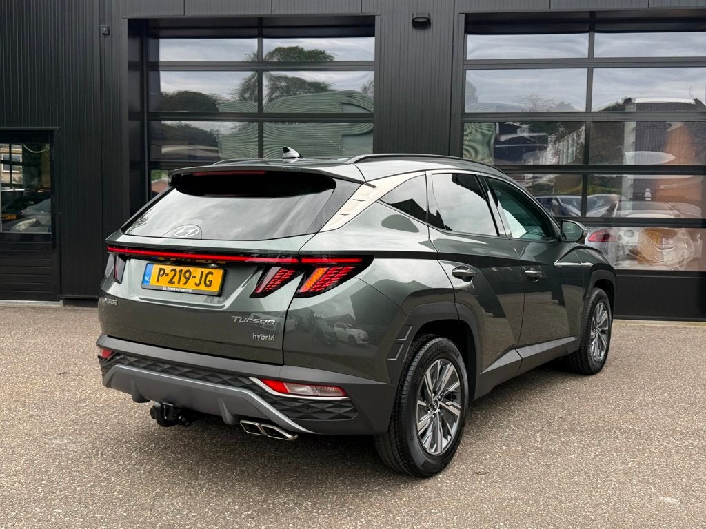 Hyundai Tucson 1.6 T-GDI HEV Comfort Leer Trekhaak 1e eig., Auto's, Hyundai, Dealer onderhouden, Gebruikt, Euro 6, 4 cilinders
