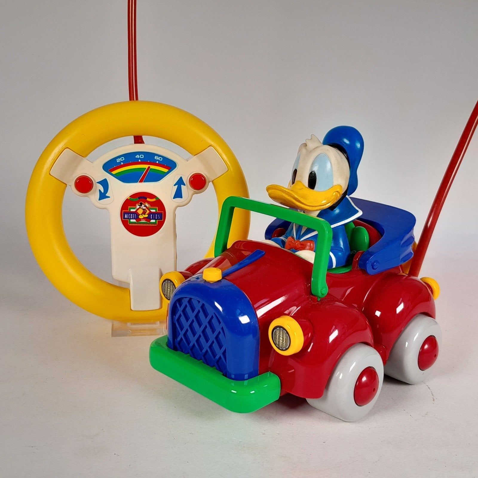 Vintage Donald Duck radiografische auto met controller 90's, Verzamelen, Ophalen of Verzenden, Donald Duck, Gebruikt, Beeldje of Figuurtje