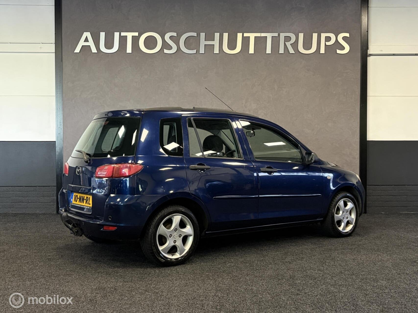 Mazda 2 1.4 Exclusive AUTOMAAT / INRUILKOOPJE / TR.HAAK /, Zwart, 4 cilinders, Blauw, Origineel Nederlands