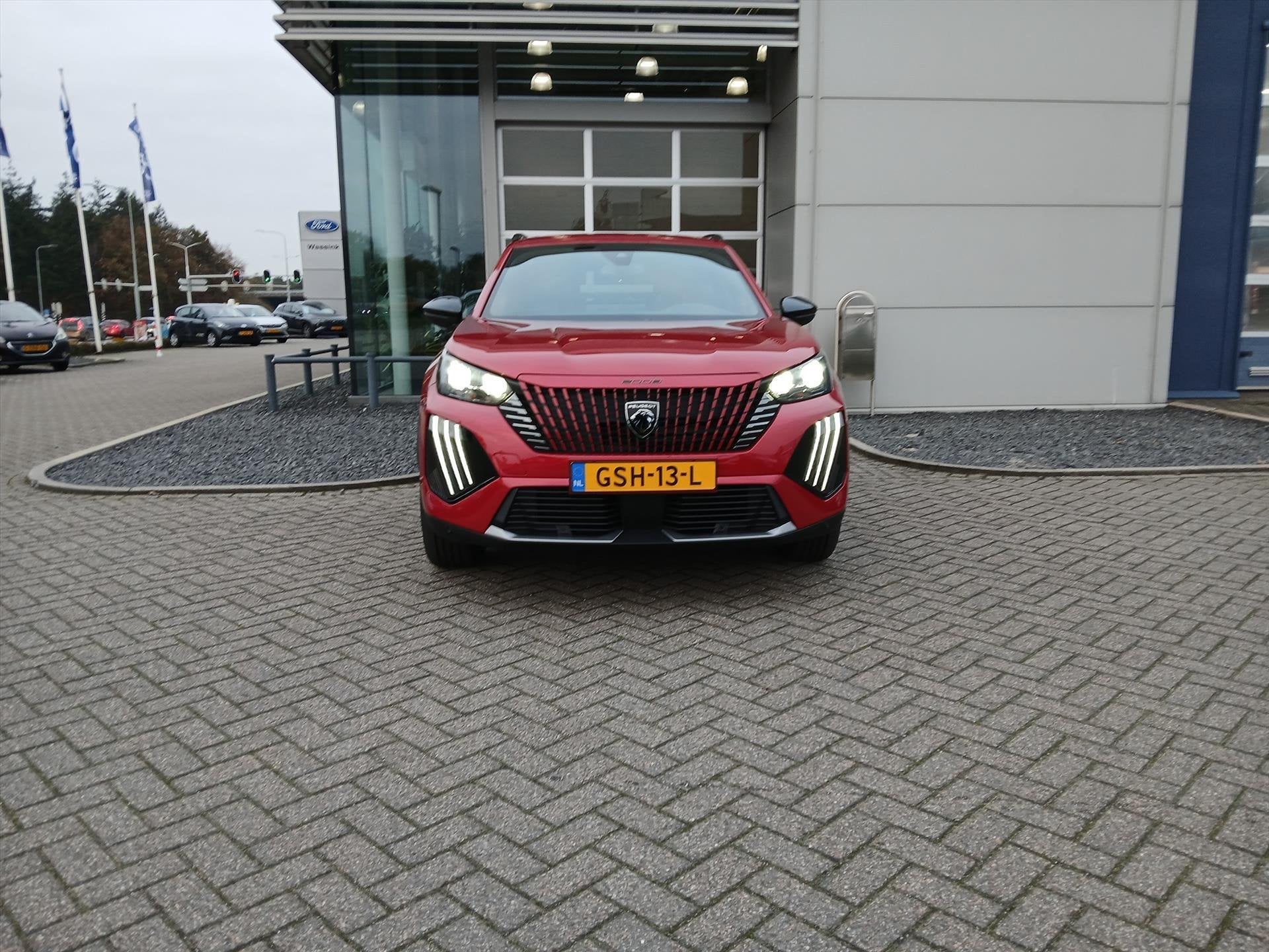 Peugeot e-2008 EV 54kWh I DEMO DEAL I 156pk Allure I Pack Dr, Auto's, Stof, Zwart, 156 pk, Origineel Nederlands
