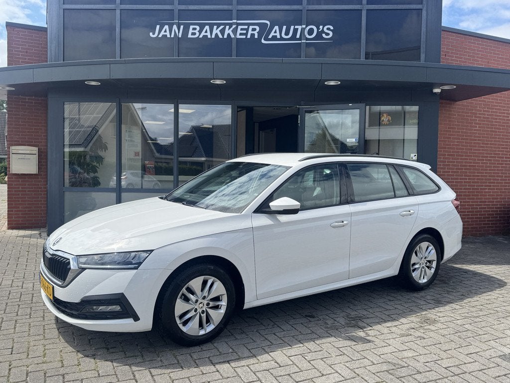 Skoda Octavia Combi 1.0 e-TSI Business Edition ✅ Automaat, Auto's, 12 maanden, Stof, Gebruikt, Hybride Elektrisch/Benzine