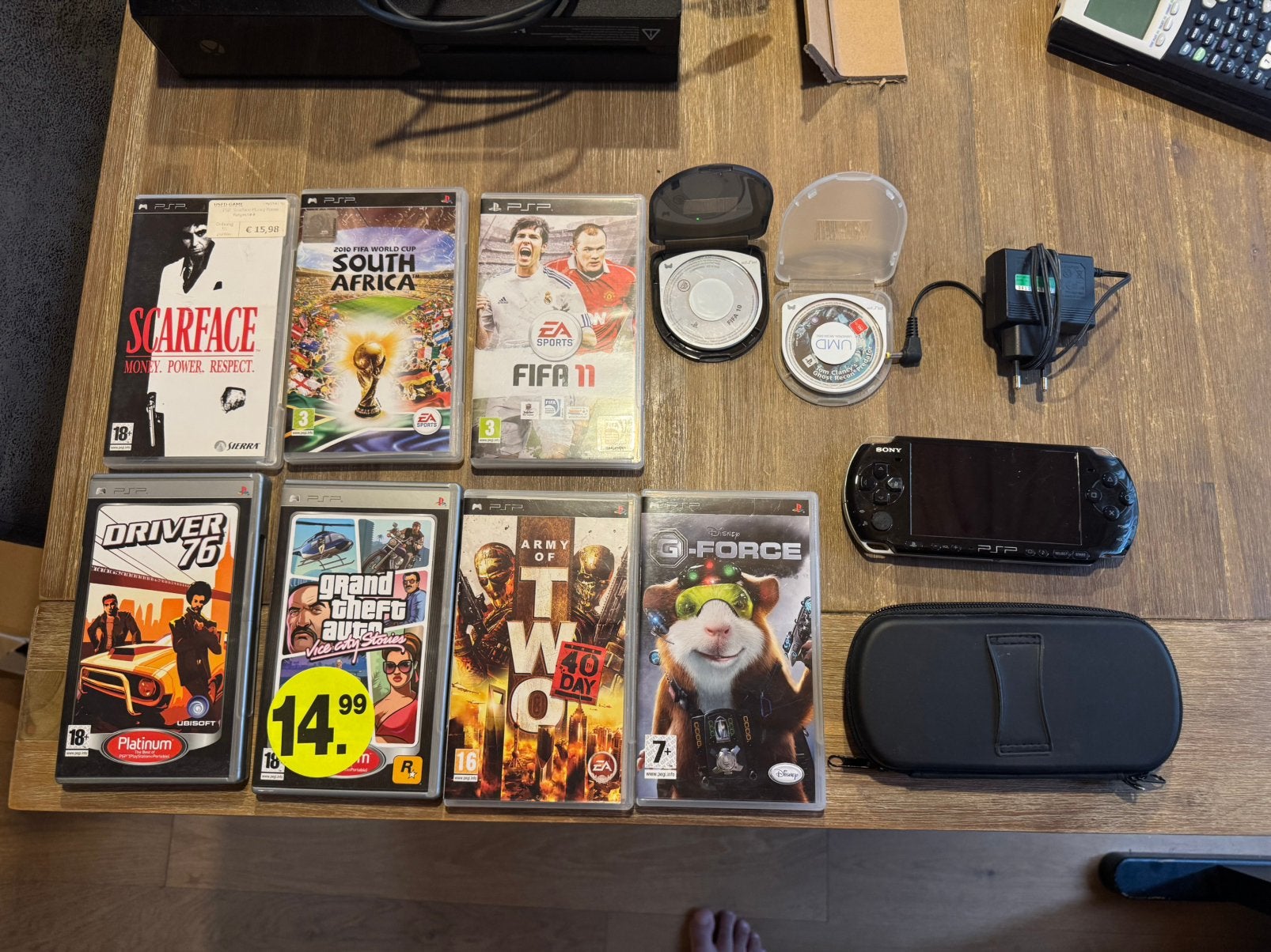 Sony PSP + 9 games + oplader + beschermhoes, Ophalen, Zo goed als nieuw, PSP